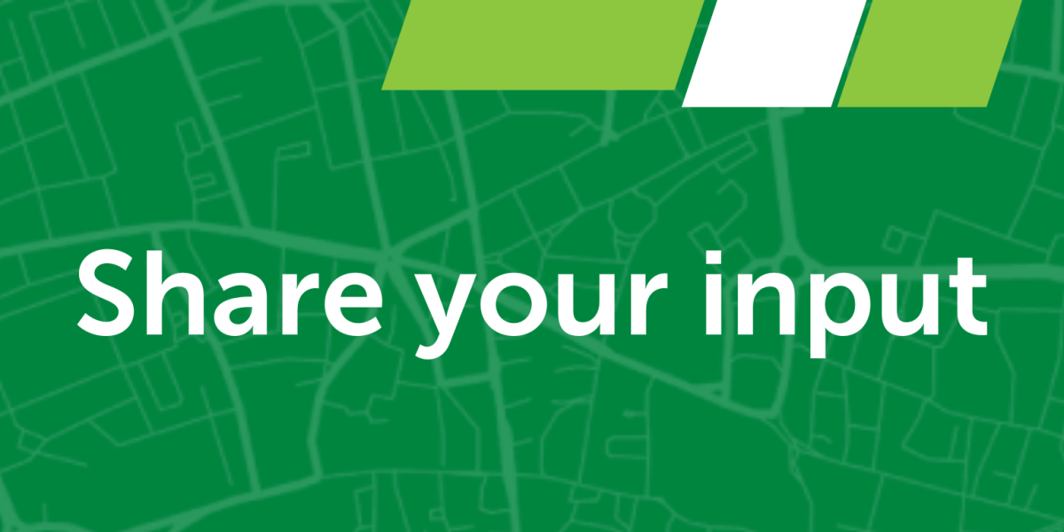 Green graphic with white map lines. White text reads: Share your input