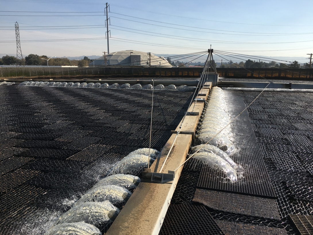 Trickling filter reduces biological oxygen demand (BOD) and total suspended solids through a biological process