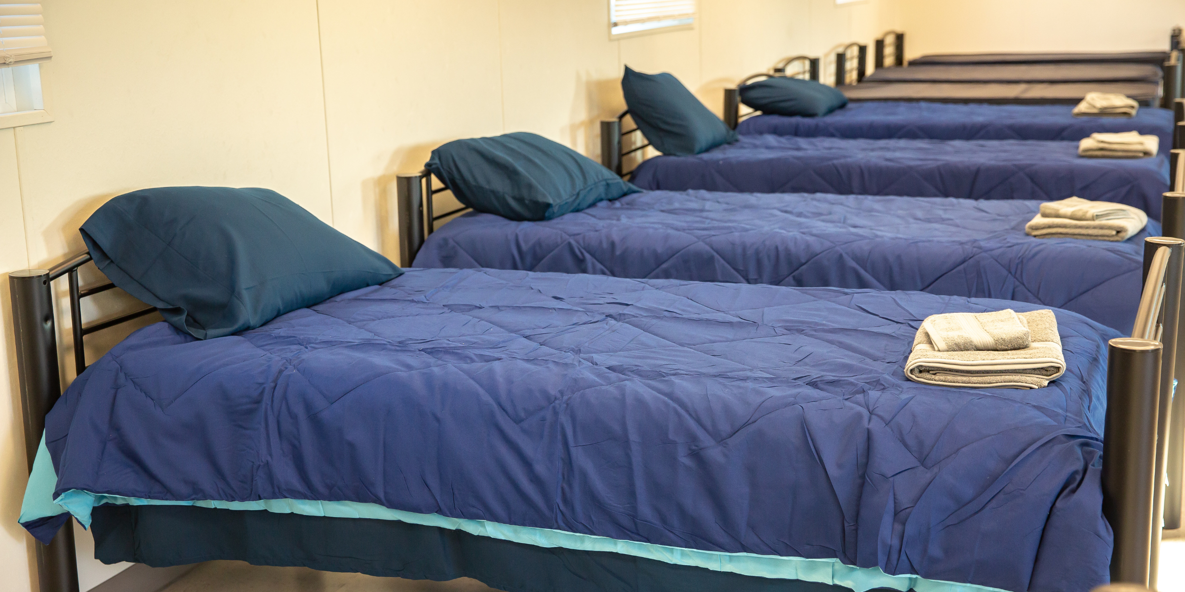 A row of beds at the Hayward Navigation Center