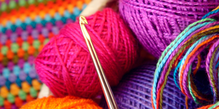 Colorful yarn and crochet hooks