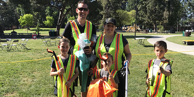 A family preparing to participate in the 2018 Citywide Cleanup