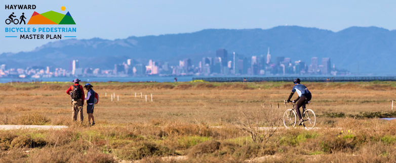 People walking and biking on the bay trail on Hayward's Shoreline