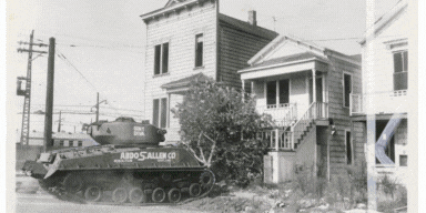 A print by Keith Dennison of a Sherman tank preparing to destroy homes, from 1960. Photograph: Oakland Museum of California/Collection of the Oakland Museum of California, Ernestine Nettles (left) and Marian Johnson at the opening of Black Spaces: Reclaim & Remain at the Oakland Museum of California, Children playing volleyball on a dirt playground at Russell school. Photograph: Courtesy of the Hayward Area Historical Society 