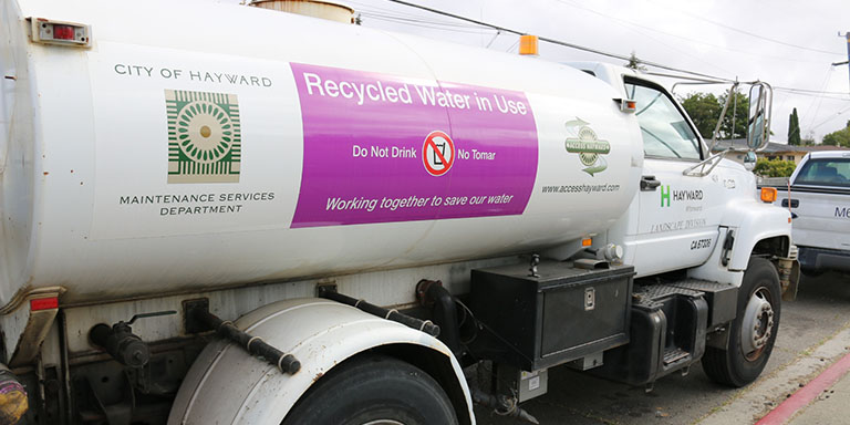 Recycled water sign on a Maintenance Services water truck