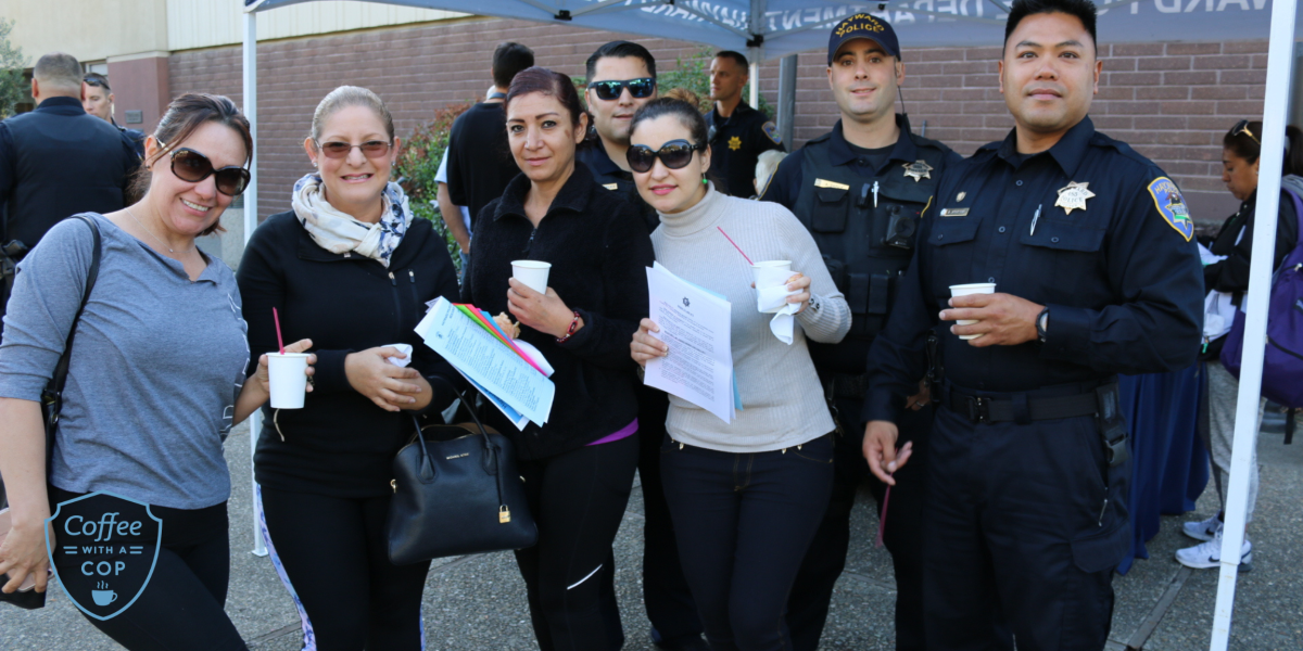 Hayward Police staff at Coffee with a Cop event speaking to community members