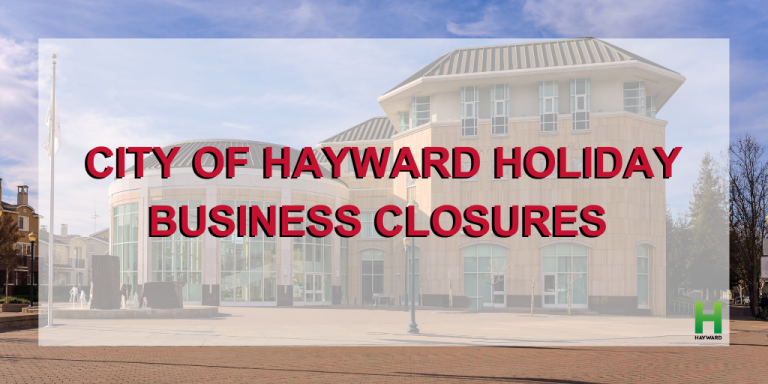 Hayward City Hall on a clear day with the words City of Hayward Holiday Business Closure on top