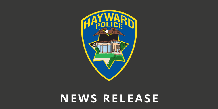 Close up the HPD badge with the text: News Release