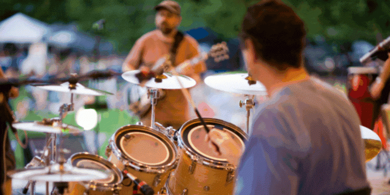 GIF of a band playing and a graphic that says 2025 Downtown Hayward Street Party
