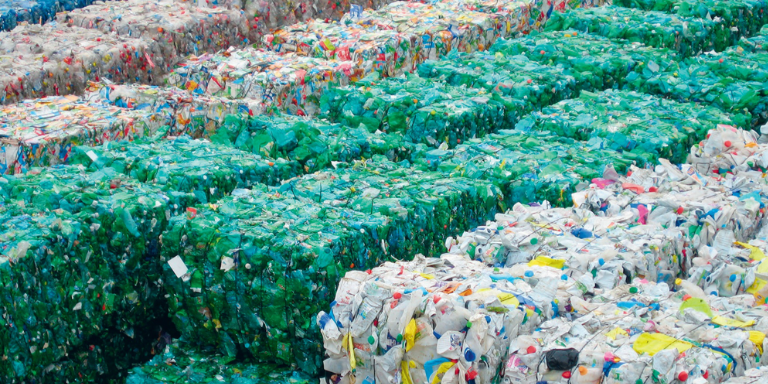 Bales of brightly colored recyclable plastic