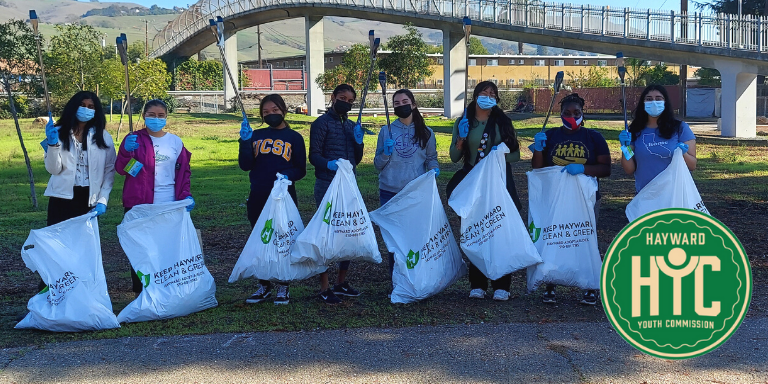 Hayward Youth Commissioners cleaning a local park