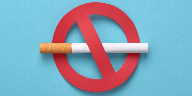 A cigarette with a red no sign