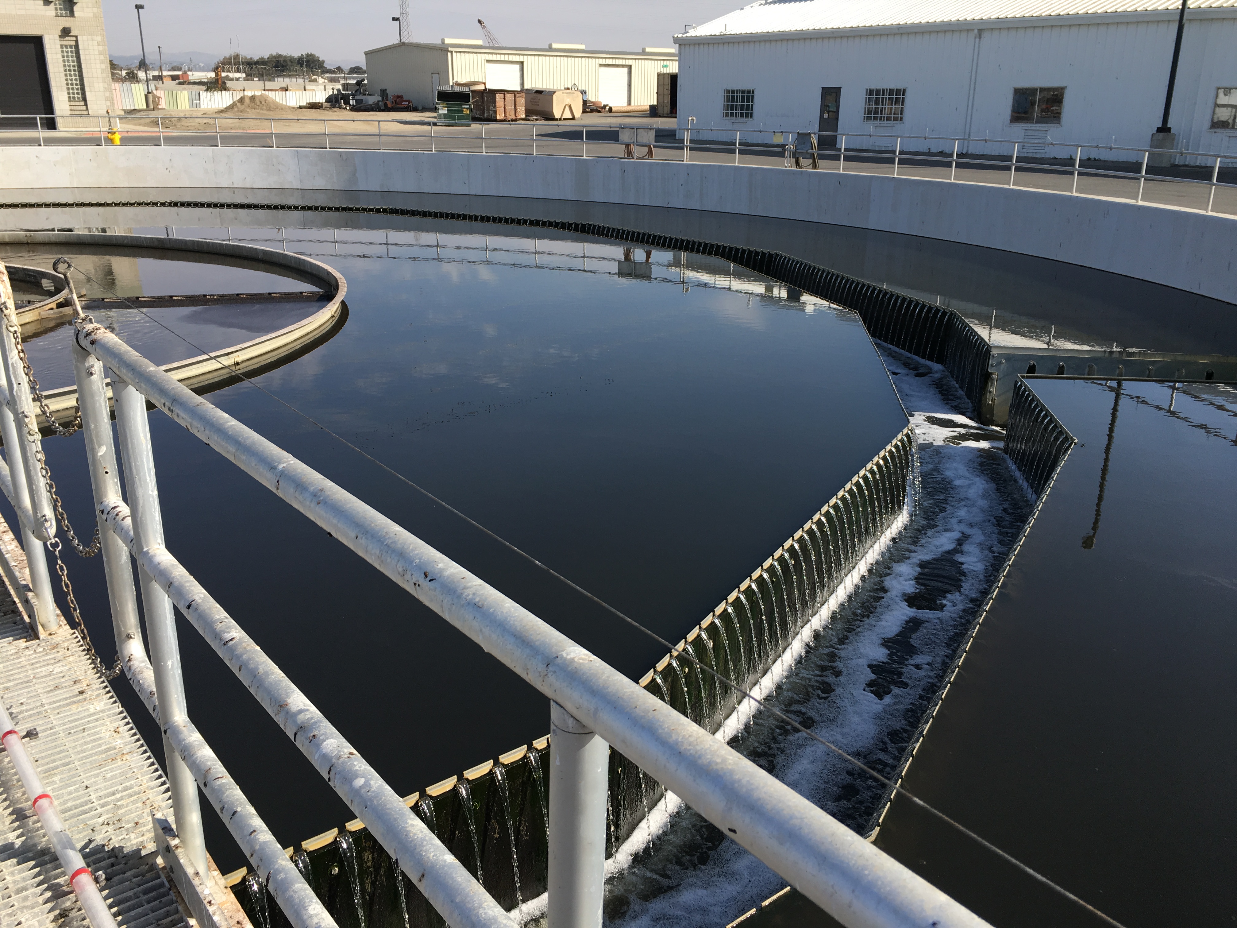Secondary clarify removes suspended solids, organic matter, which are then thickened and broken down in anaerobic digesters. The digesters produce biogas that fuel the on-site co-generation engine. 